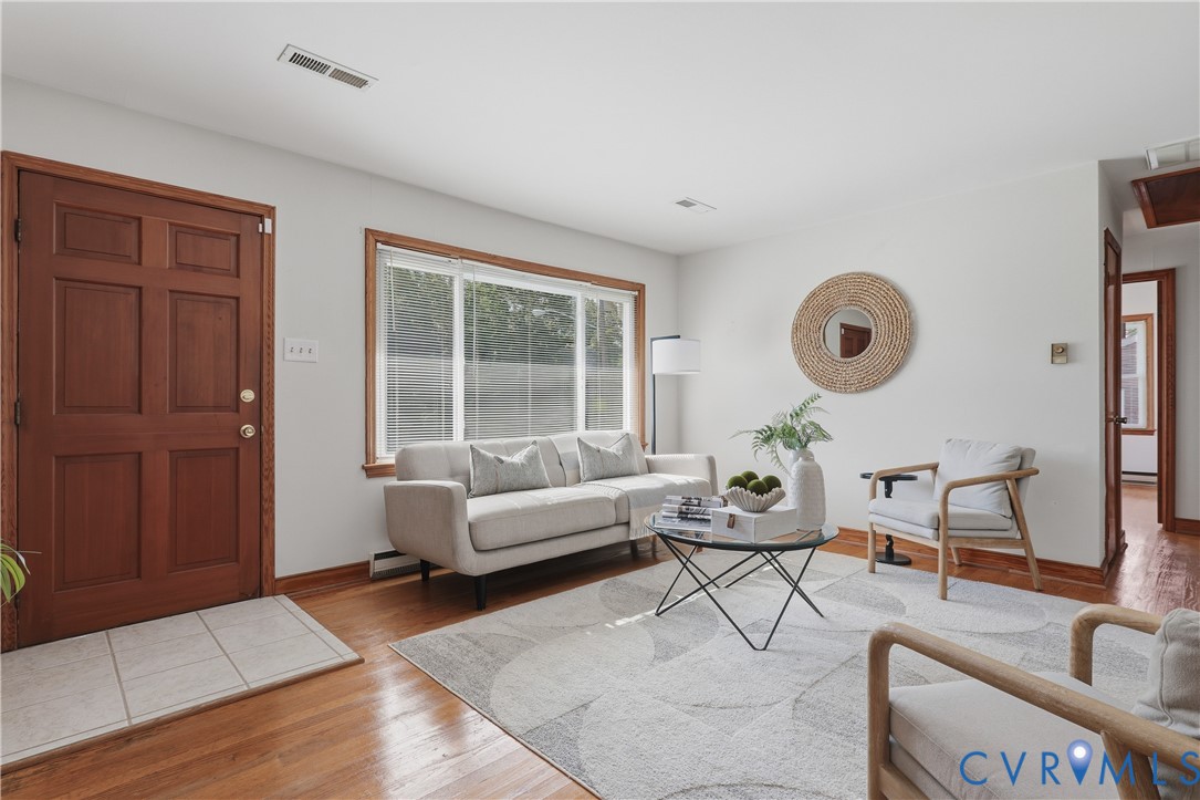 5210 Ronson Road North Chesterfield, VA 23234 - Photo 6 of 35 Light-filled living space featuring wood-finish fl