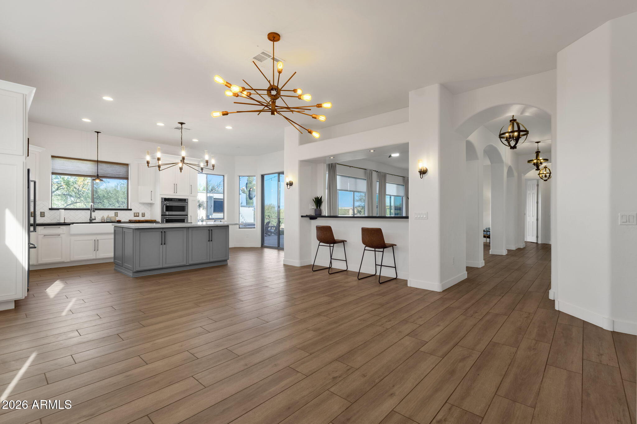 14604 East Peak View Road Scottsdale, AZ 85262 - Photo 15 of 55 a view of a big room with wooden floor and windows