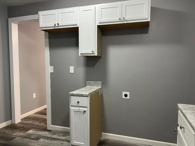a view of storage and utility room with washer and dryer