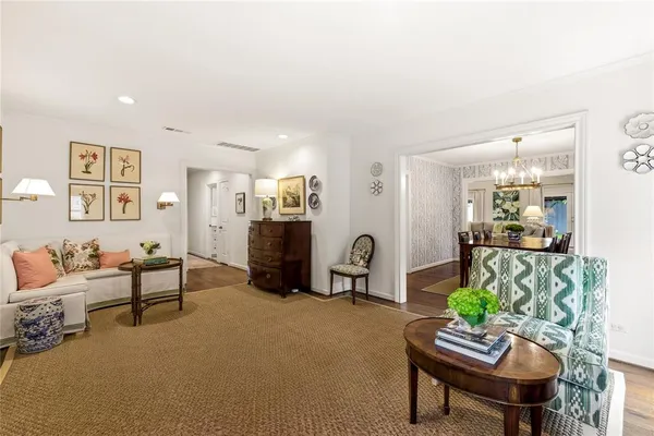 a living room with furniture and a table