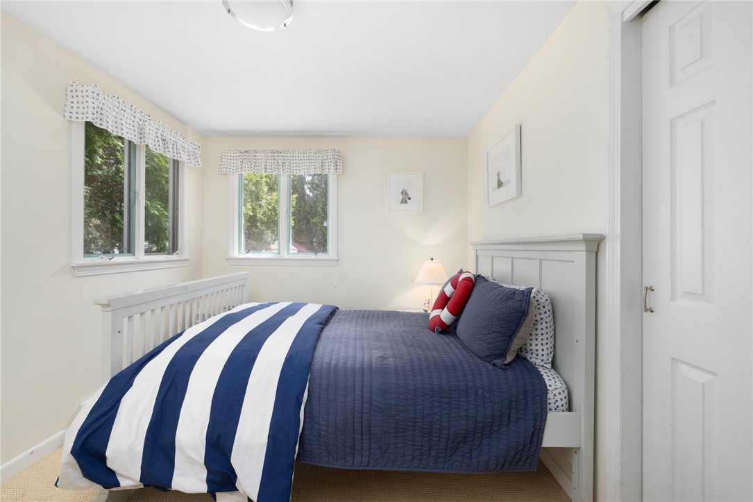 8 Schoolhouse Road Narragansett, RI 02882 - Photo 22 of 41 Second bedroom on first floor has the luxury of 2 double windows and a double closet.