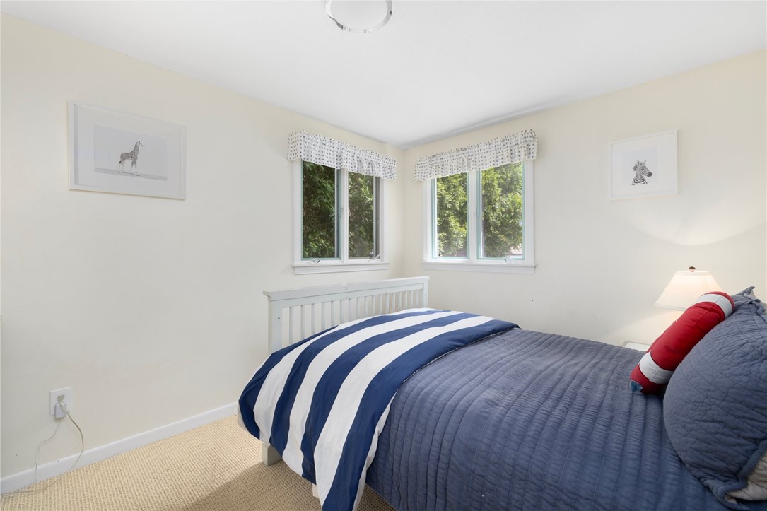 8 Schoolhouse Road Narragansett, RI 02882 - Photo 23 of 41 9' by 12' bedroom on first floor.