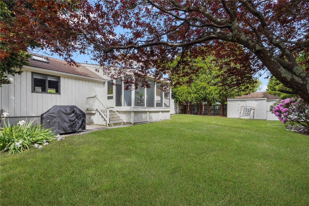 8 Schoolhouse Road Narragansett, RI 02882 - Photo 40 of 41 A yard with space for almost every activity or function including an outdoor shower just beyond porch...a MUST for seaside living!