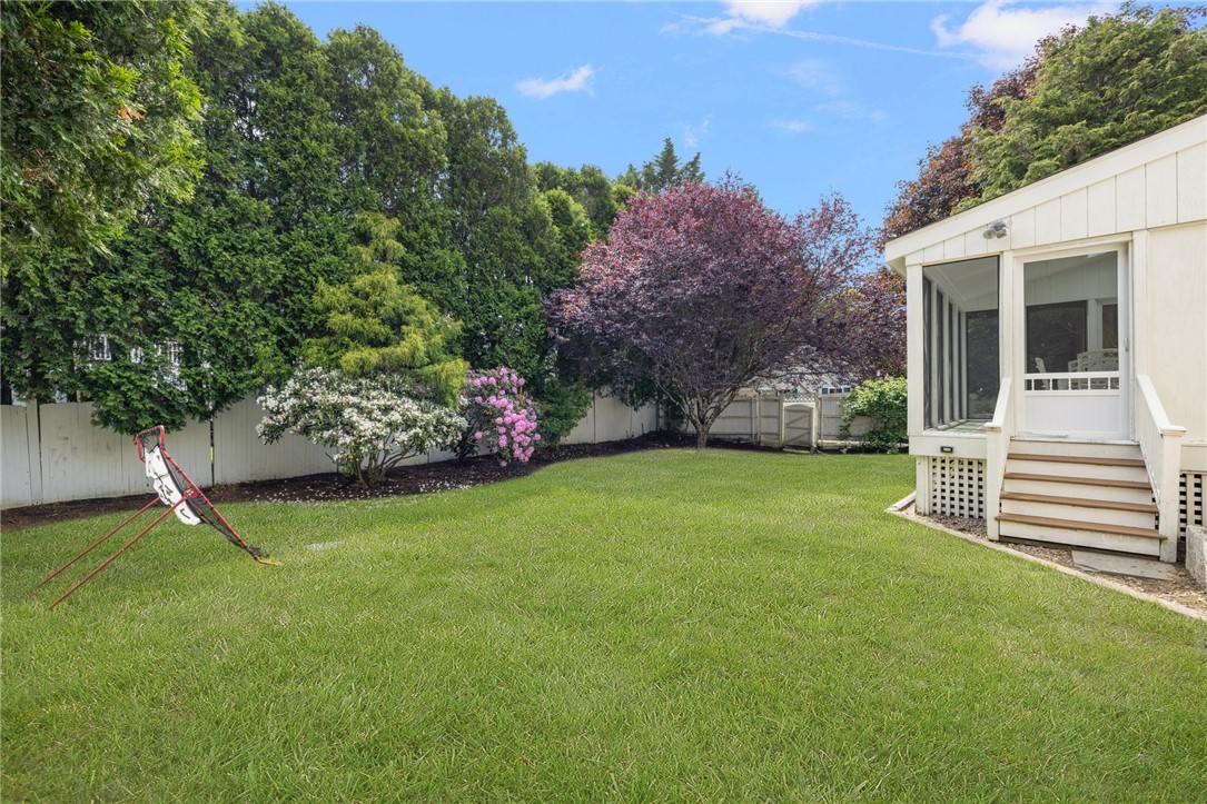 8 Schoolhouse Road Narragansett, RI 02882 - Photo 41 of 41 This relaxing rear yard is where you want to be on weekends and workday evenings. Come visit to experience for yourself.