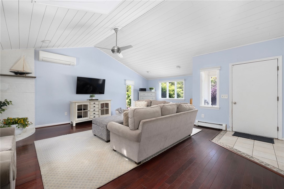 8 Schoolhouse Road Narragansett, RI 02882 - Photo 6 of 41 23'8" X 21'6" Family Room. There is a double closet to the right of the front door, convenient for coats, boots and everything else!! Hearth in corner for wood stove.