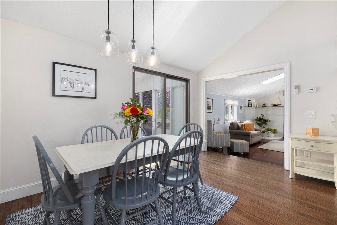 8 Schoolhouse Road Narragansett, RI 02882 - Photo 9 of 41 A lovely view of the dining room and its placement as the center of the home.....in between the family room, kitchen and outdoor living screened porch.