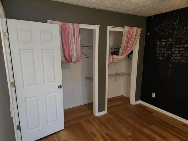 a bathroom with a sink vanity and a mirror
