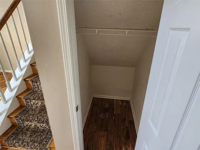 a view of an entryway with a front door