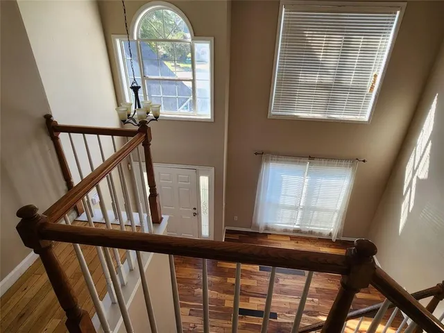 a view of a livingroom with wooden floor