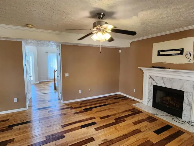 a view of a livingroom with wooden floor