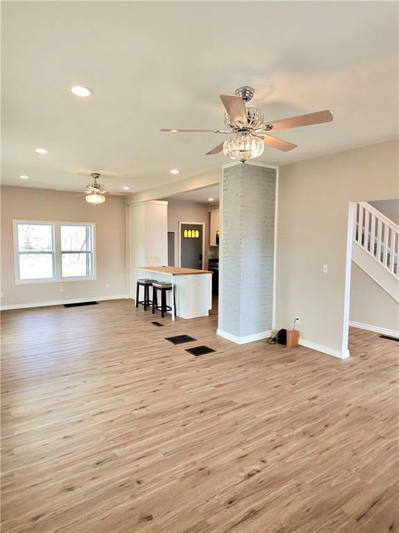 514 Ridge Avenue Canonsburg, PA 15317 - Photo 7 of 20 a view of an empty room with window and wooden floor