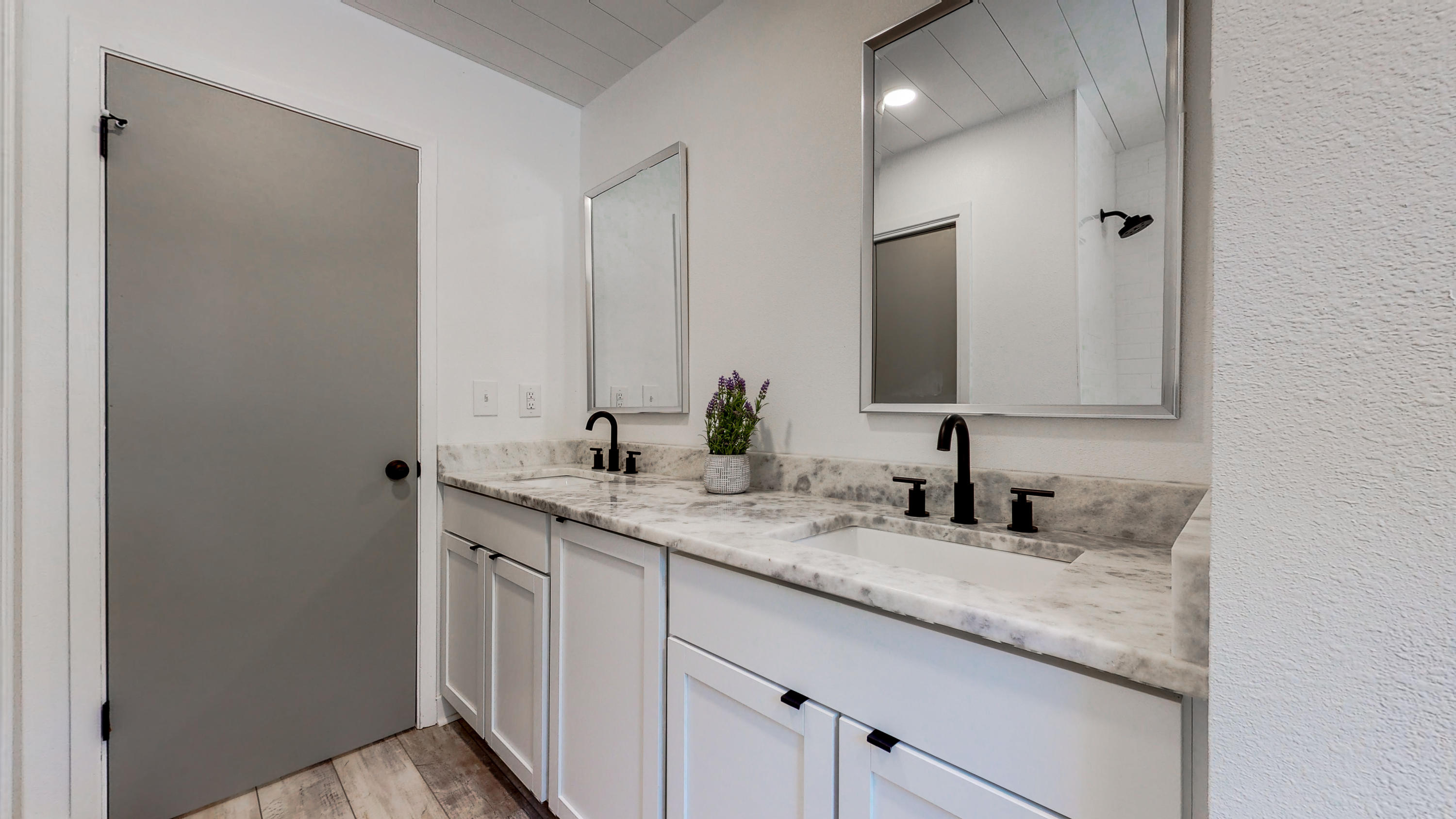 2522 Kingston Road Crestview, FL 32536 - Photo 13 of 43 a bathroom with a granite countertop sink and a mirror