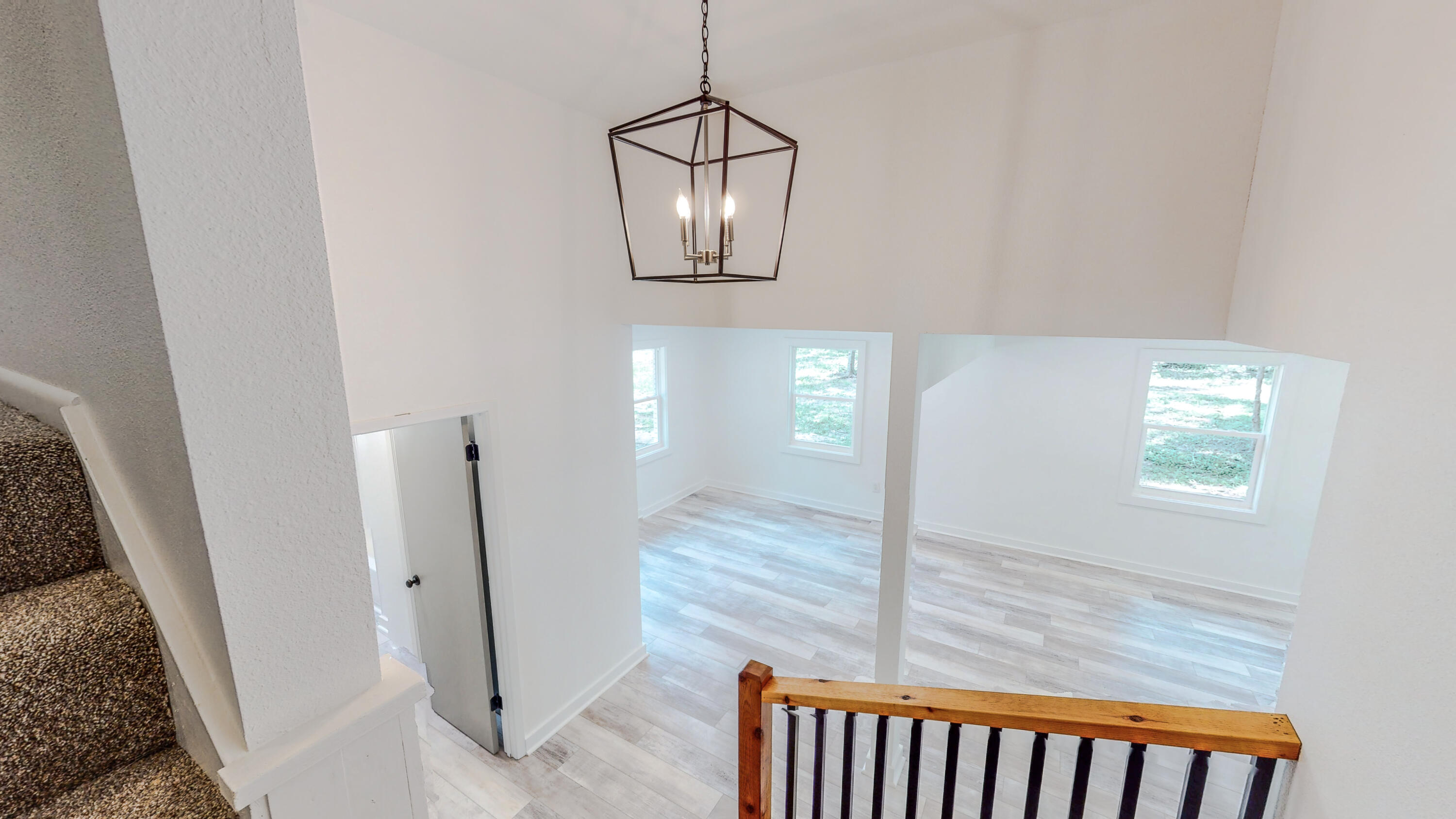 2522 Kingston Road Crestview, FL 32536 - Photo 26 of 43 a view of a hallway with windows