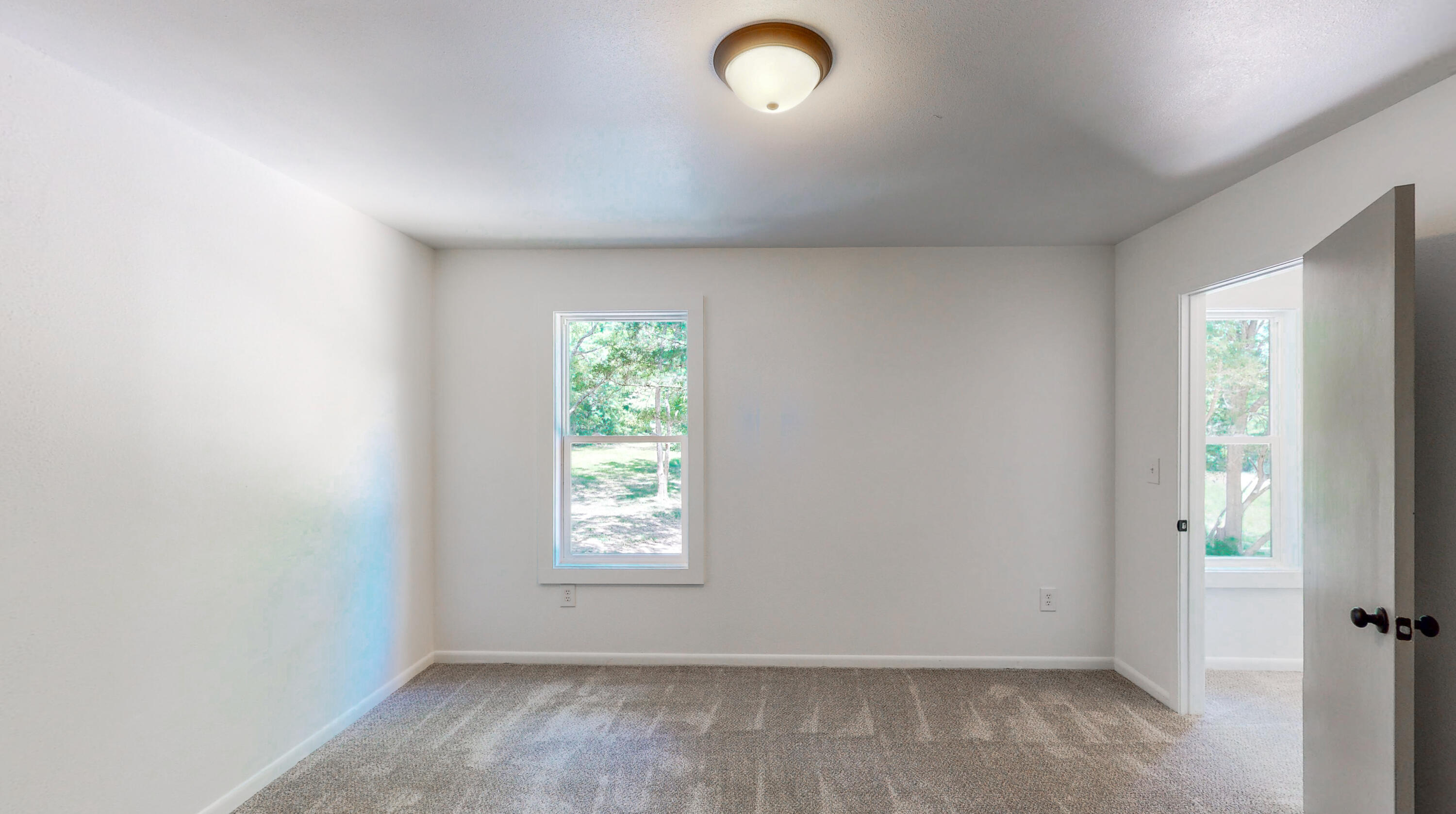 2522 Kingston Road Crestview, FL 32536 - Photo 30 of 43 an empty room with windows