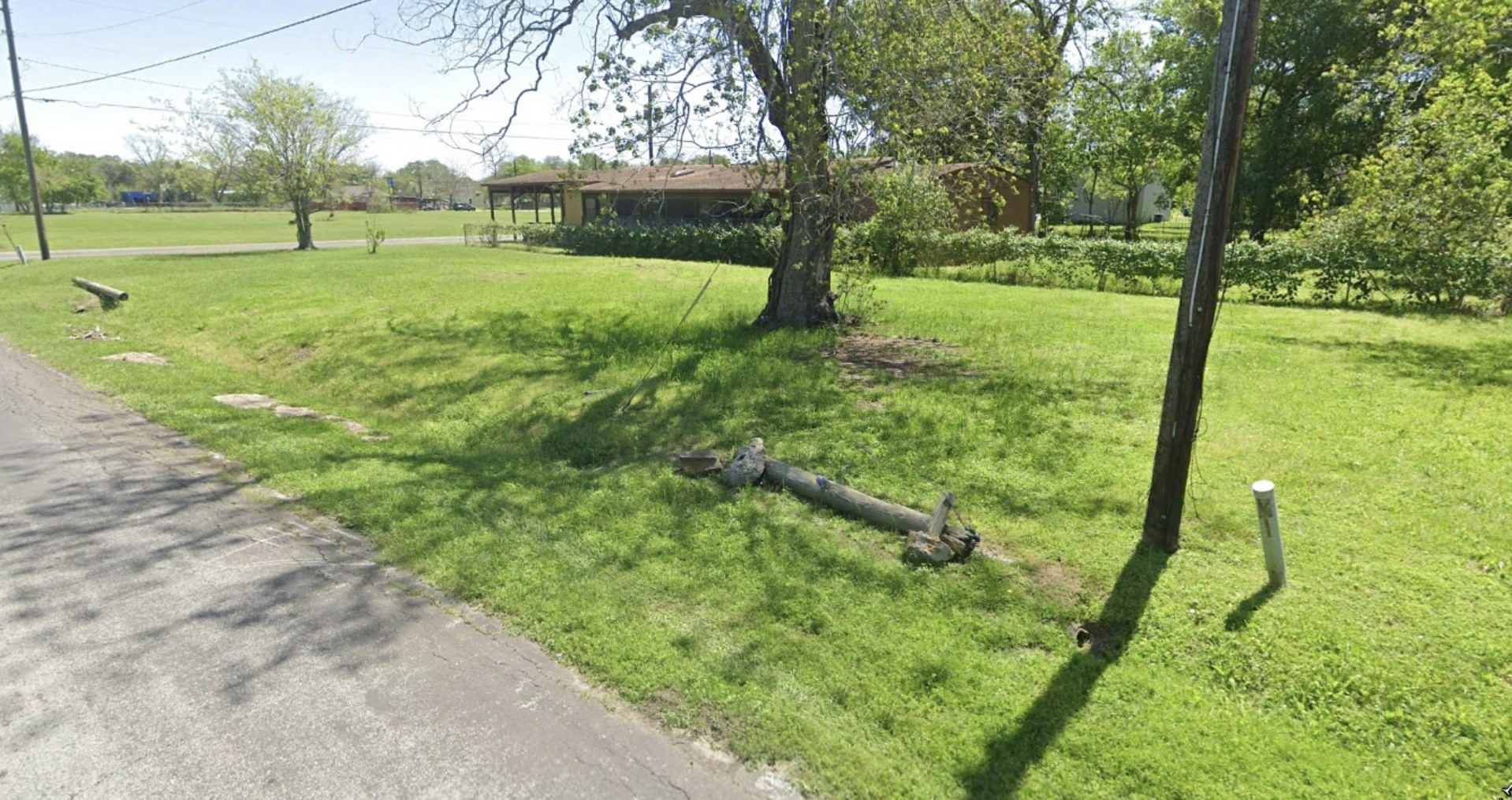 1416 Rugeley Street Bay City, TX 77414 - Photo 6 of 8 a view of a park with large trees