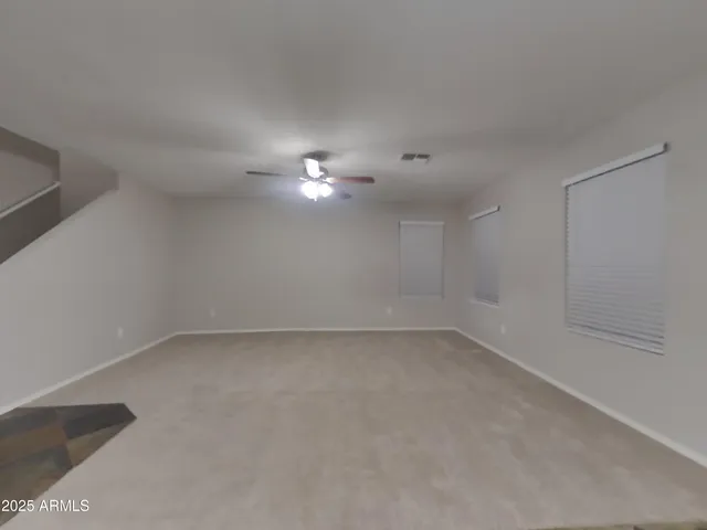 a view of a kitchen with a sink and a stove top oven