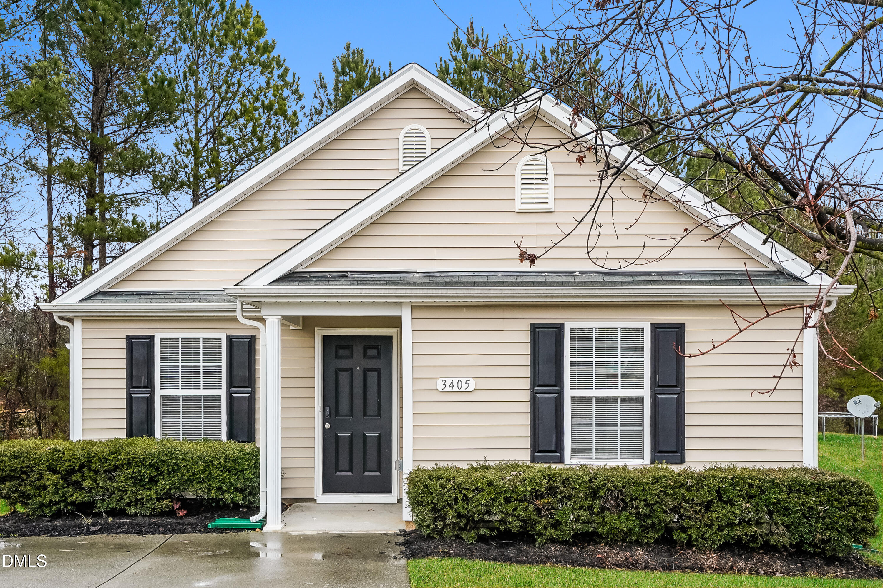 3405 Mogollon Court Raleigh, NC 27610 - Photo 1 of 16 a front view of a house with a yard