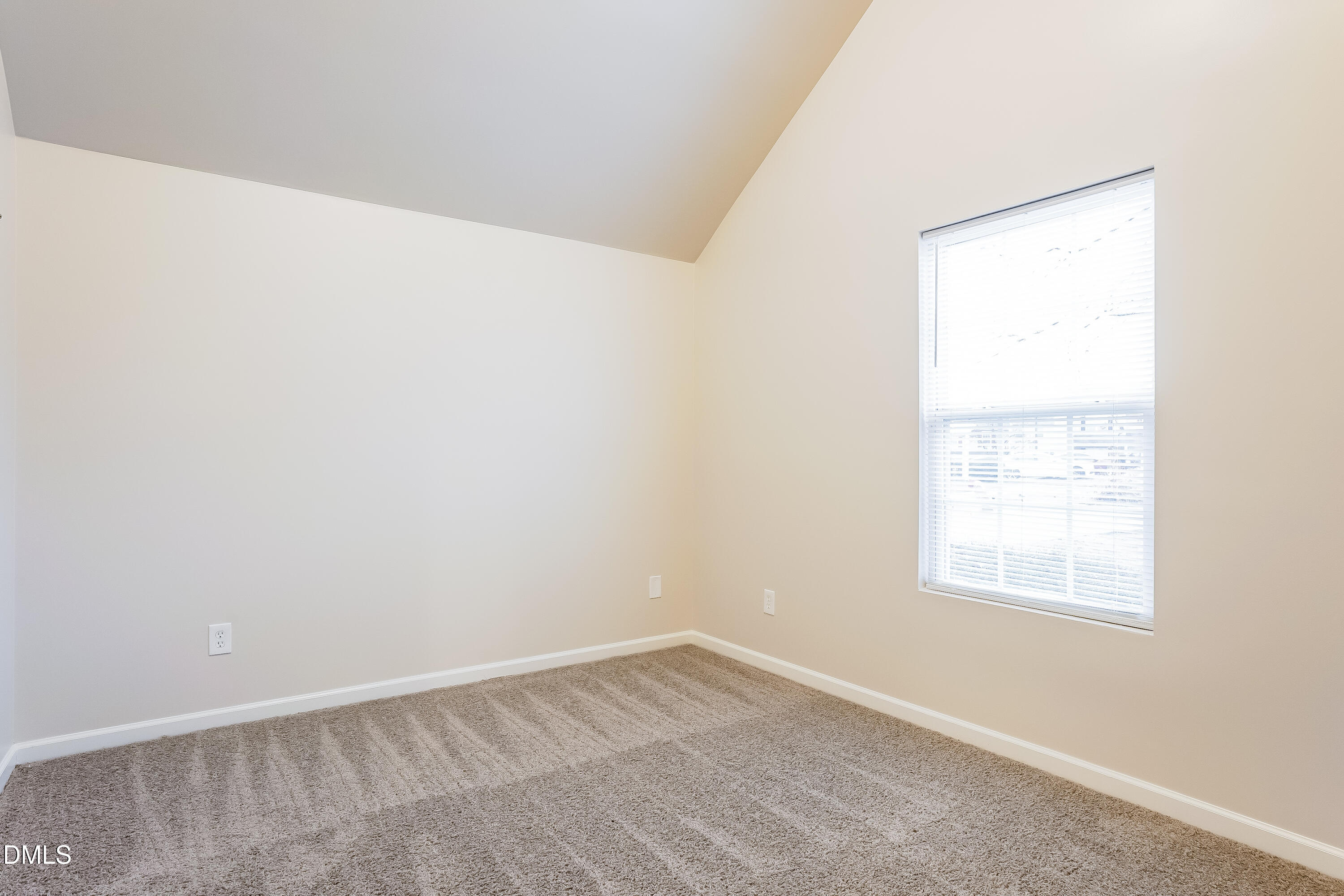 3405 Mogollon Court Raleigh, NC 27610 - Photo 12 of 16 an empty room with a window