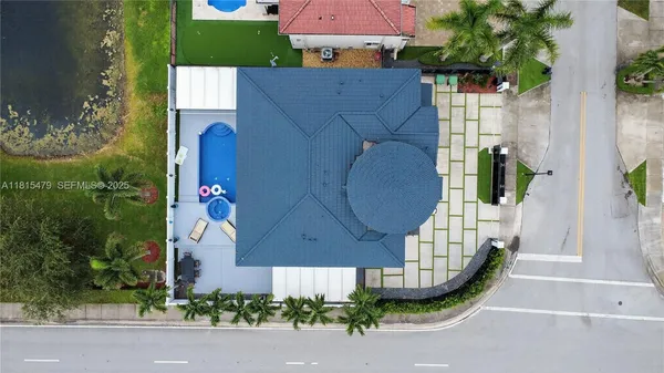an aerial view of a house having yard