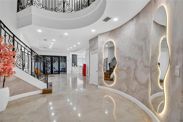a view of a hallway with entryway