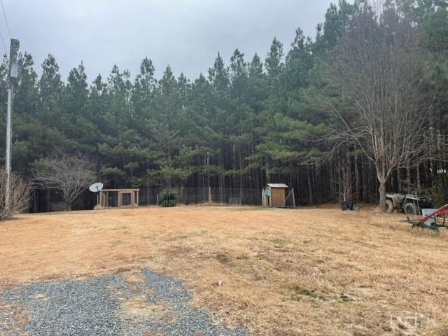 1730 Hermon Road Saxe, VA 23967 - Photo 2 of 23 a tall white house with trees in the background