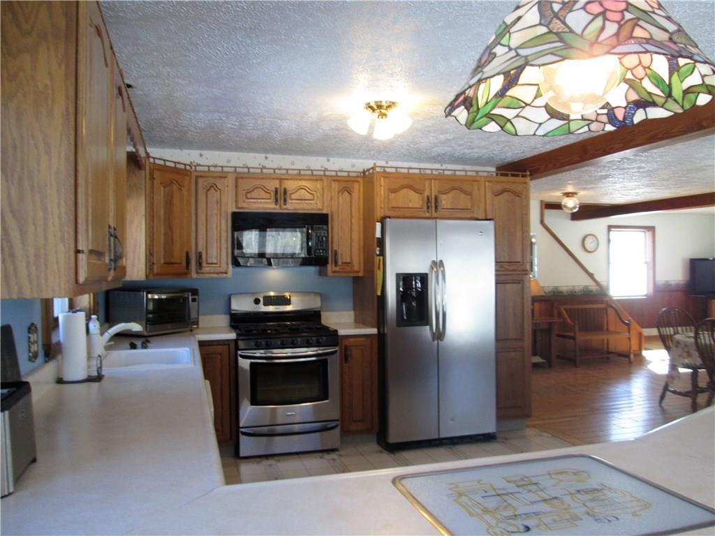 157 Cumner Road Vienna, ME 04360 - Photo 3 of 21 Open concept kitchen-dining-living.