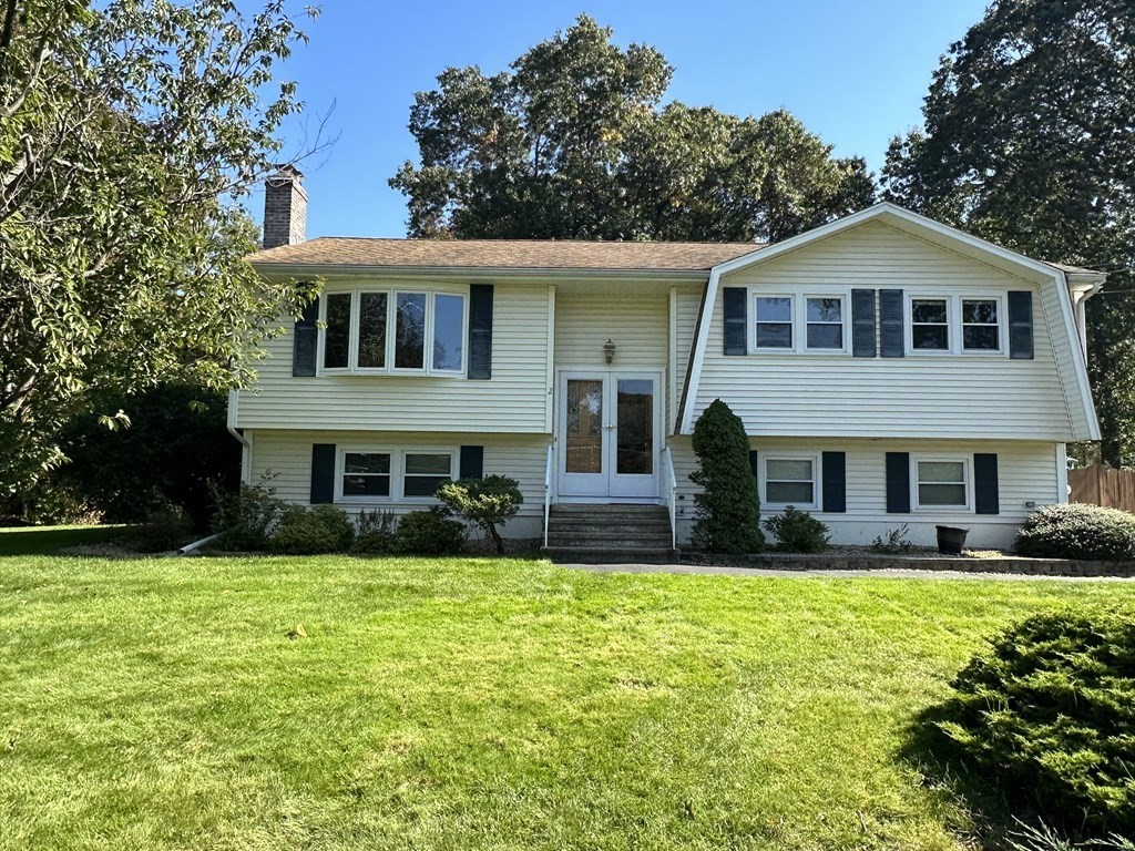 2 Monticello Circle Billerica, MA 01821 - Photo 1 of 19 a front view of house with yard and green space