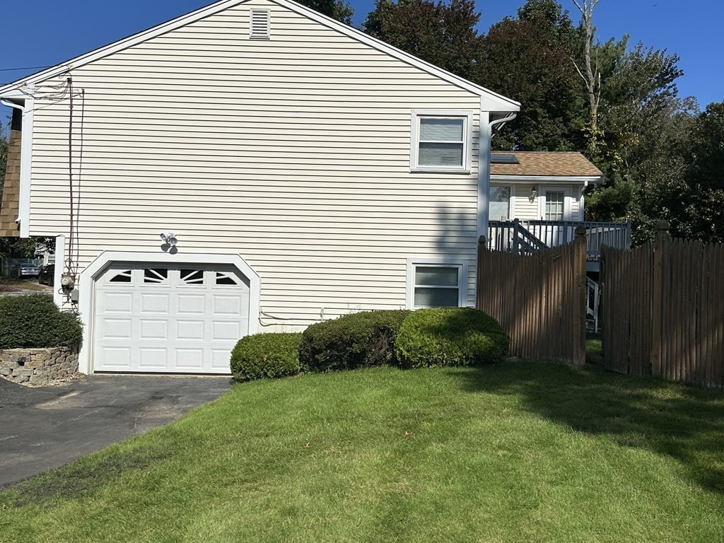 2 Monticello Circle Billerica, MA 01821 - Photo 3 of 19 a front view of a house with garden