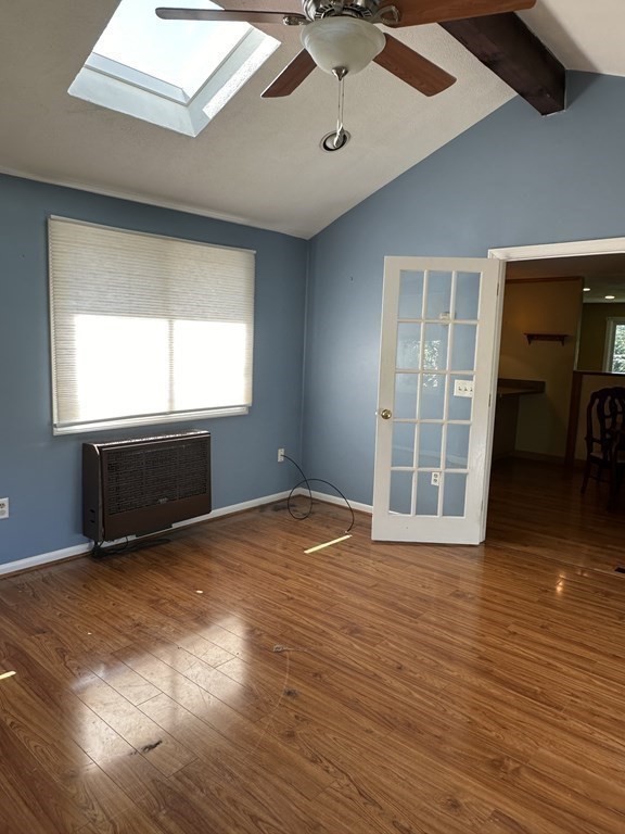 2 Monticello Circle Billerica, MA 01821 - Photo 7 of 19 an empty room with wooden floor and windows