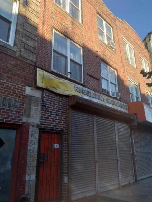 a building view with a brick wall