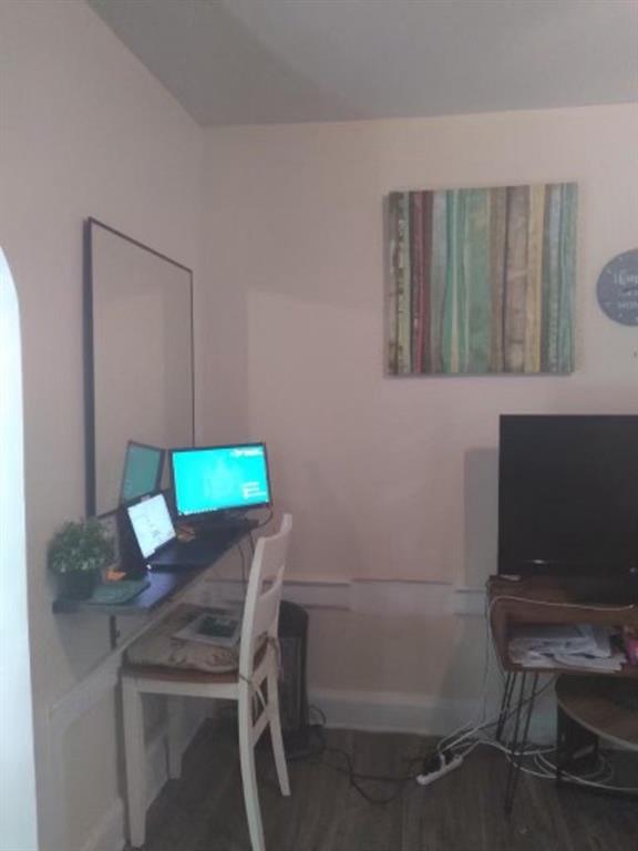 1772 Nostrand Avenue Brooklyn, NY 11226 - Photo 11 of 22 a room that has a bed and a chair in it