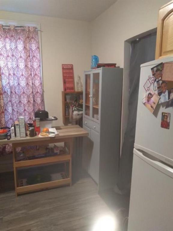 1772 Nostrand Avenue Brooklyn, NY 11226 - Photo 13 of 22 a view of kitchen appliances and cabinets