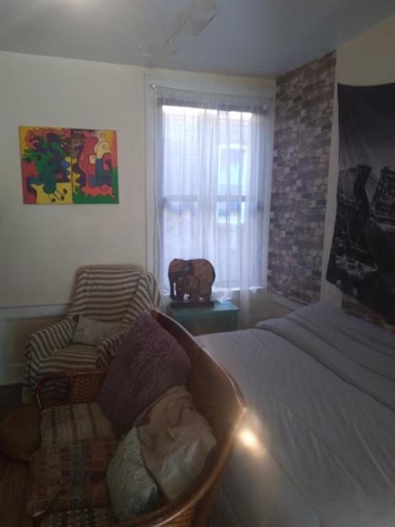 1772 Nostrand Avenue Brooklyn, NY 11226 - Photo 15 of 22 a living room with furniture and a window