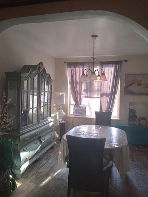 1772 Nostrand Avenue Brooklyn, NY 11226 - Photo 2 of 22 a view of a dining room with furniture wooden floor and chandelier