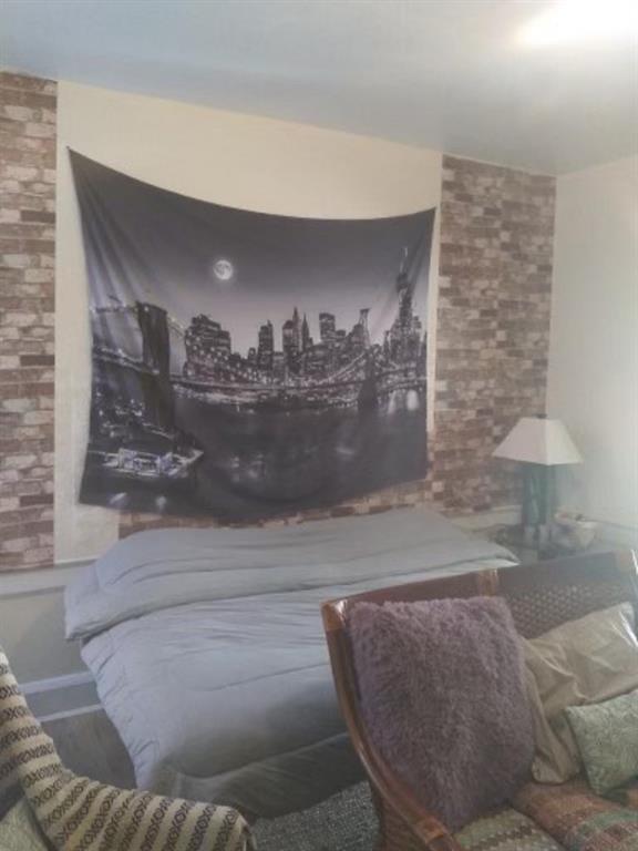 1772 Nostrand Avenue Brooklyn, NY 11226 - Photo 3 of 22 a room with a couch
