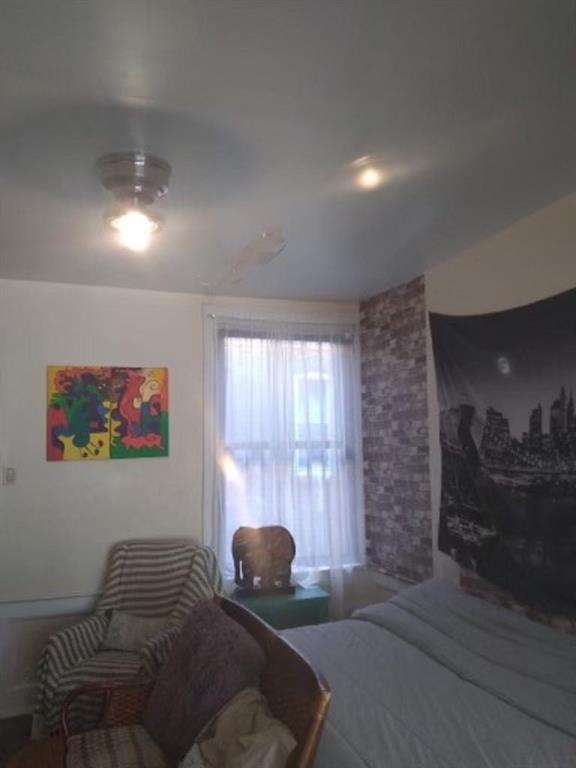 1772 Nostrand Avenue Brooklyn, NY 11226 - Photo 8 of 22 a living room with furniture and a window