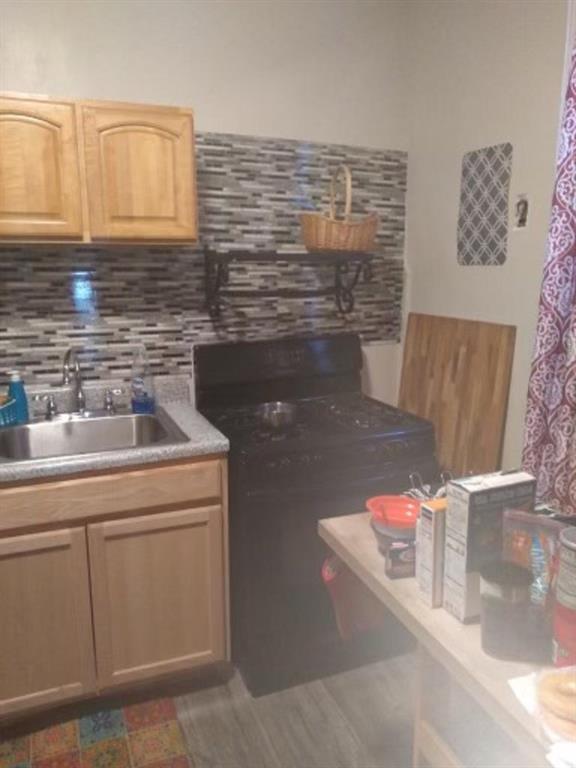 1772 Nostrand Avenue Brooklyn, NY 11226 - Photo 10 of 22 a bathroom with a sink and a mirror