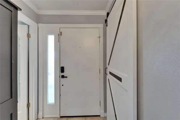 a view of a bathroom with a glass shower door
