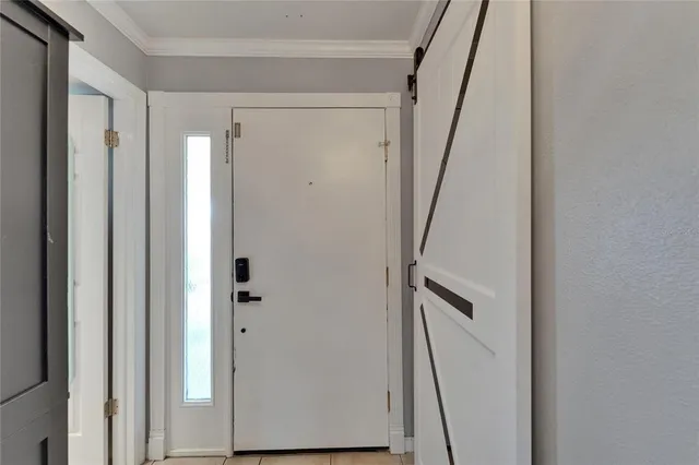 a view of a bathroom with a glass shower door