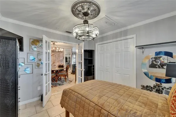 a kitchen with a refrigerator and a sink