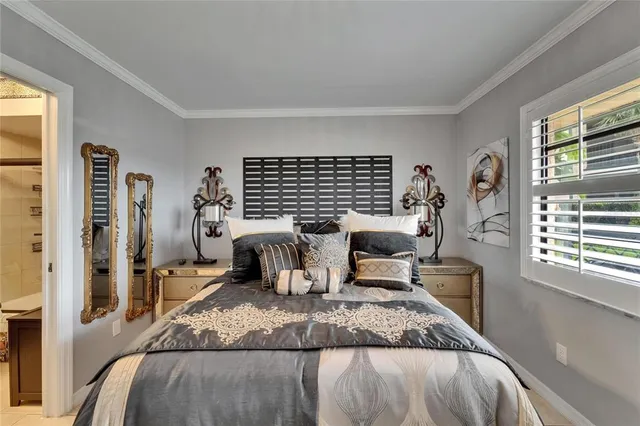 a view of a chairs and table in the balcony