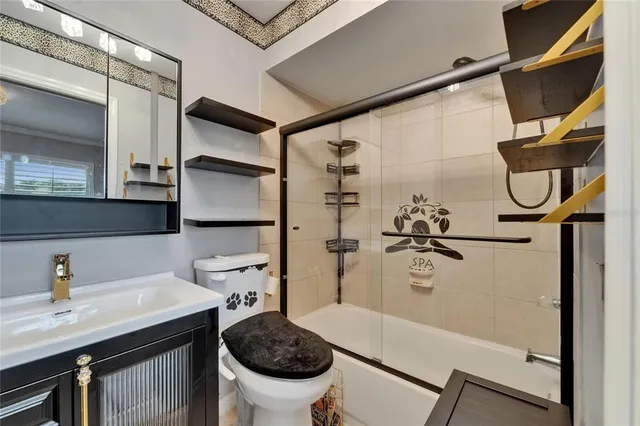a view of a patio with table and chairs and potted plants