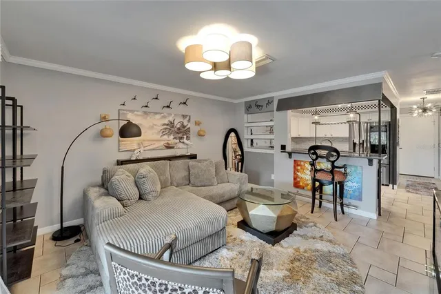 a view of a house with patio and a garden