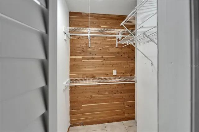 an aerial view of a house with a lake view