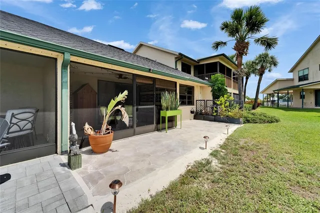 an aerial view of a house with outdoor space