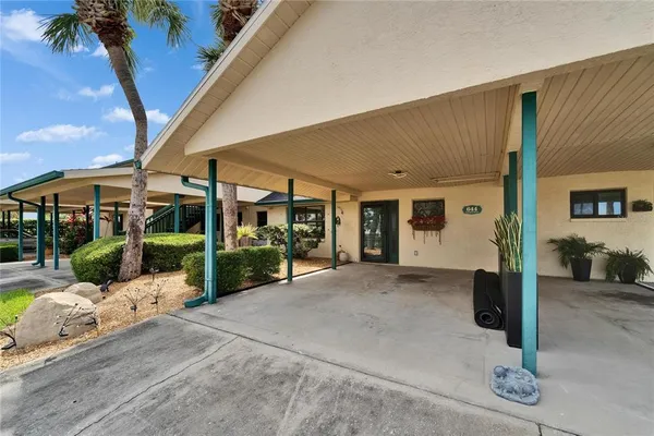 a bathroom with a toilet a sink and shower