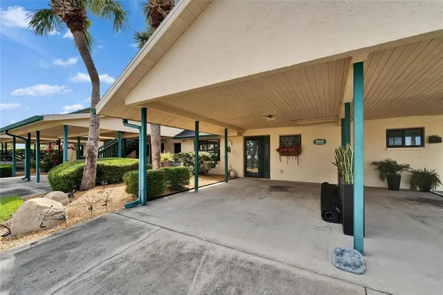 a bathroom with a toilet a sink and shower