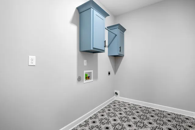 a room with a white wall and a window