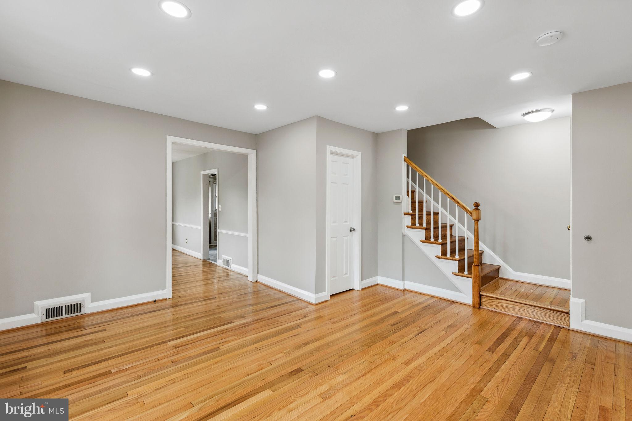 1581 Stonewood Road Baltimore, MD 21239 - Photo 5 of 21 a view of an entryway with wooden floor