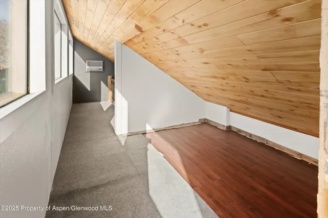 a view of outdoor space with wooden floor and trees